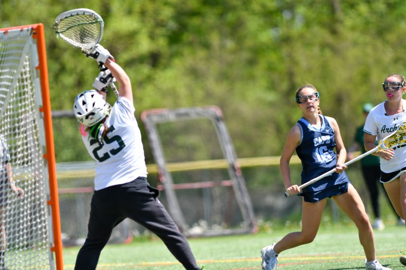 Mackenzie Todd scores past goalie Mia Luce.