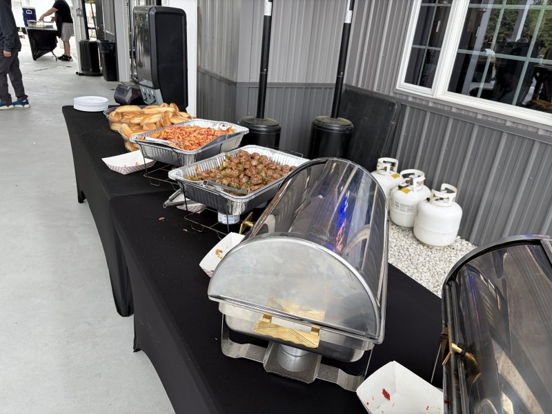 Guests at Firkin Fest are treated to a food buffet from Da Nizza Pizza.