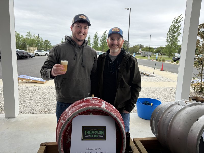 Ian Nuzum, left, and Justin leahy of Thompson Island Brewing Company of Rehoboth Beach show off their Fabulous Hazy IPA conditioned with pineapple and dolcita.