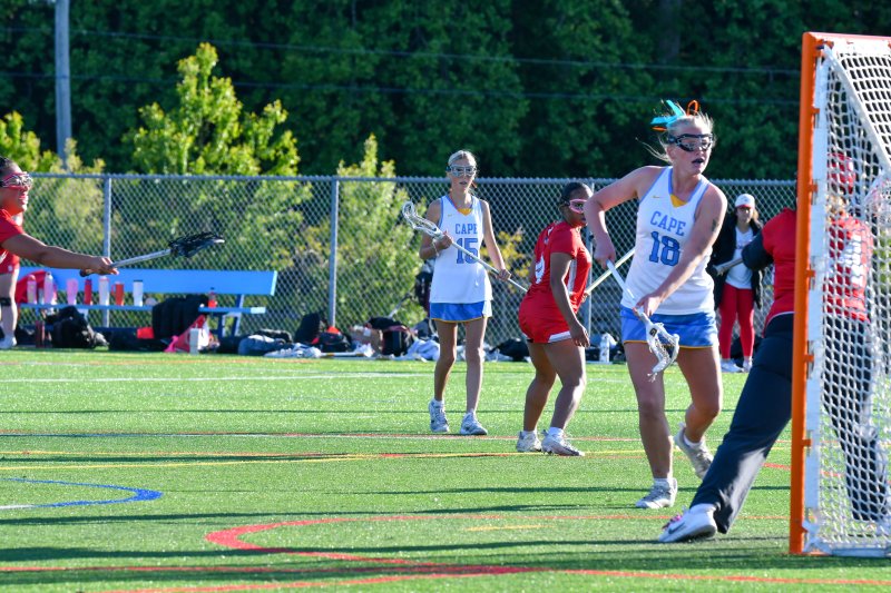 Harper Derrick scores for the JV team.